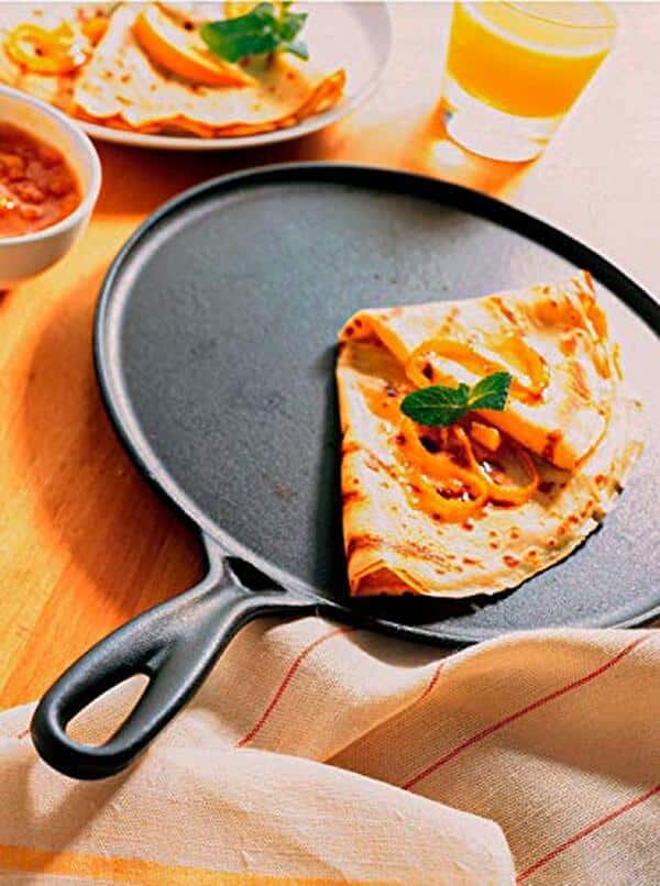 Découvrez notre test complet de la crêpière en fonte Le Creuset 27 cm avec accessoires. Soyez inspirés par ses performances culinaires et trouvez votre crêpière idéale.